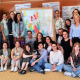 A group photo of the participants of the 8th Meeting of Inclusion and Diversity Officers in front of a map of Europe.