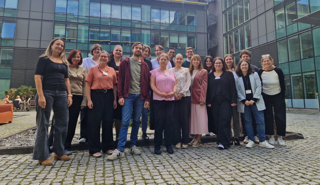 Group photo of participants at the Erasmus+ and European Solidarity Corps Inclusion and Diversity Strategy consultation in Brussels, standing together in the courtyard of the European Commission’s DG EAC premises.