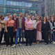 Group photo of participants at the Erasmus+ and European Solidarity Corps Inclusion and Diversity Strategy consultation in Brussels, standing together in the courtyard of the European Commission’s DG EAC premises.